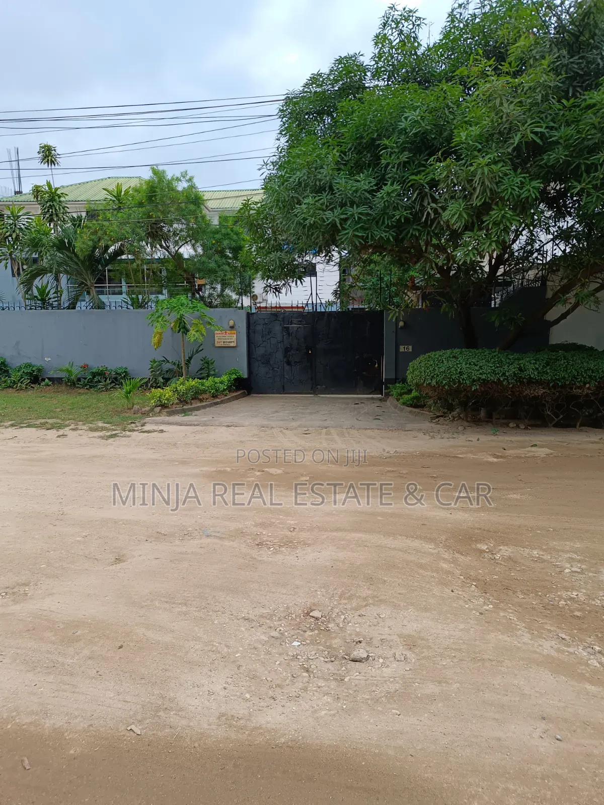 Plot for Sale in Masaki With the Building Inside the Compound
