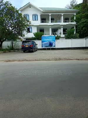 Plot for Sale in Masaki With 2 Floors Building