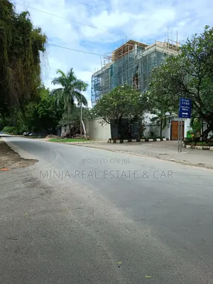 Plot for Sale in Masaki With 2 Floors Building