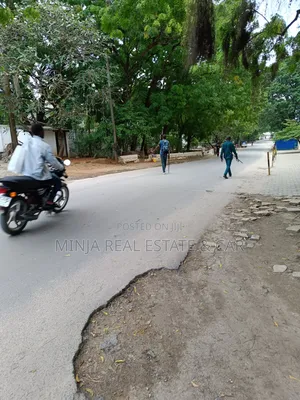 Plot for Sale in Masaki With 2 Floors Building