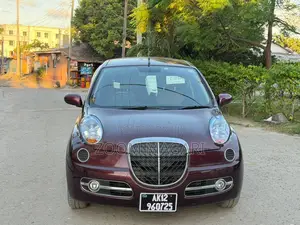 Nissan March 2006 Maroon