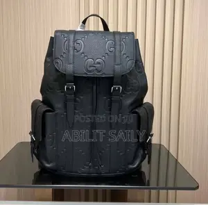 Gucci Back Packs.