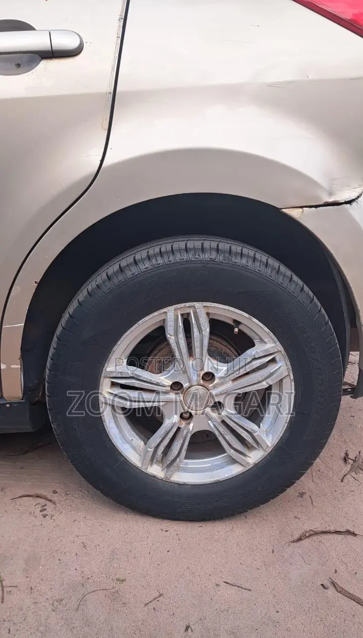 Nissan Tiida 2003 Beige