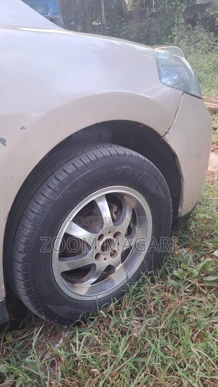 Nissan Tiida 2003 Beige
