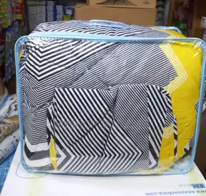 Duvet 1 Shuk1 Folonya 2 Size Ni 6 Kwa 7 Yellow, Black, and White.