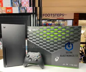 Xbox Series X Console, Its Controller, and the Retail Box.