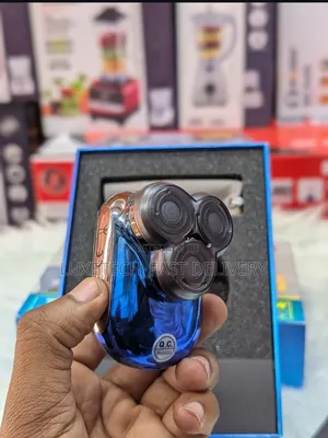 Kemei Km-T83 Mini Electric Rotary Shaver