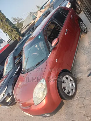 Mazda Verisa 2010 Red