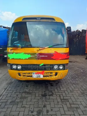 Toyota Coaster 2002 Yellow