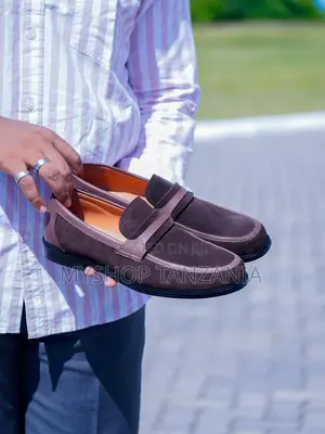 Brown Suede Bass Loafers Feature a Distinctive Moccasin-Style