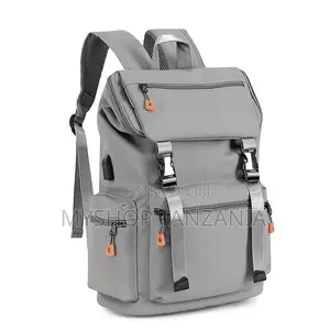 Gray Backpack Features a USB Charging Port and Quick-Release Buckles