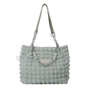 Charming Charlie Tote Bag Features a Light Green Bubble Texture