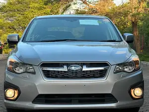 Subaru Impreza 2.0i Limited PZEV 4dr Hatchback AWD (2.0L 4cyl CVT) 2014
