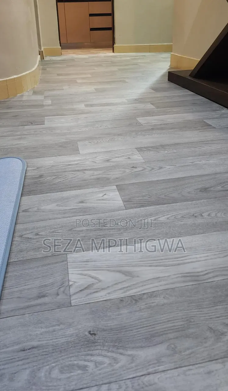 Mkeka Wa Mbao (Wood Grain PVC Flooring Roll)