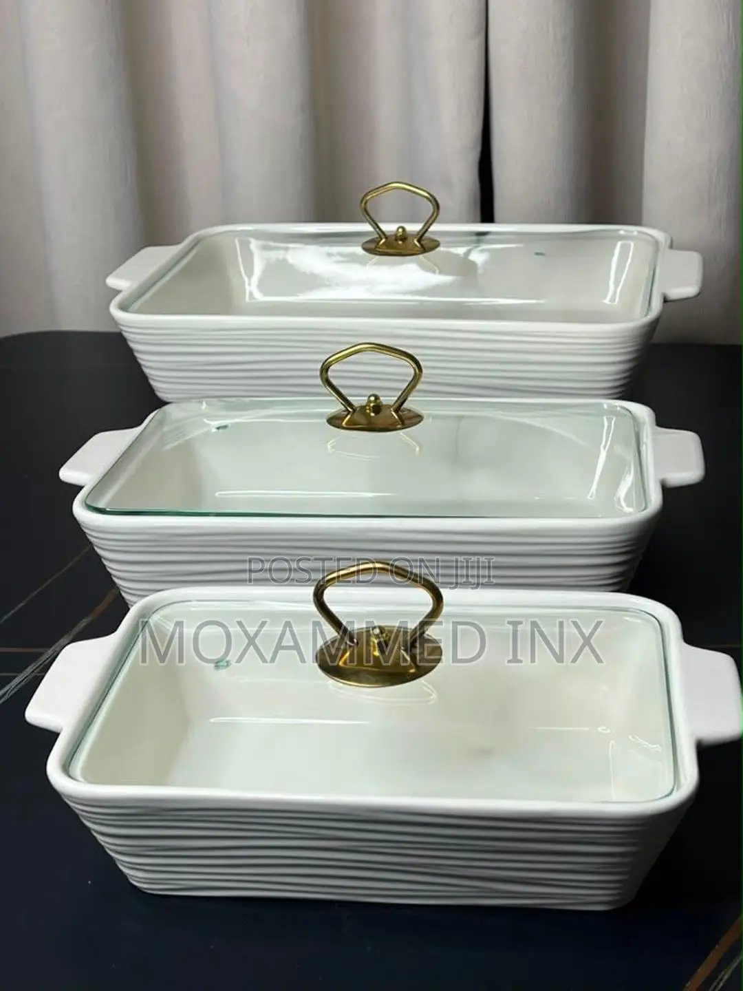 Stack of Three White Ribbed Ceramic Serving and Baking Casserole
