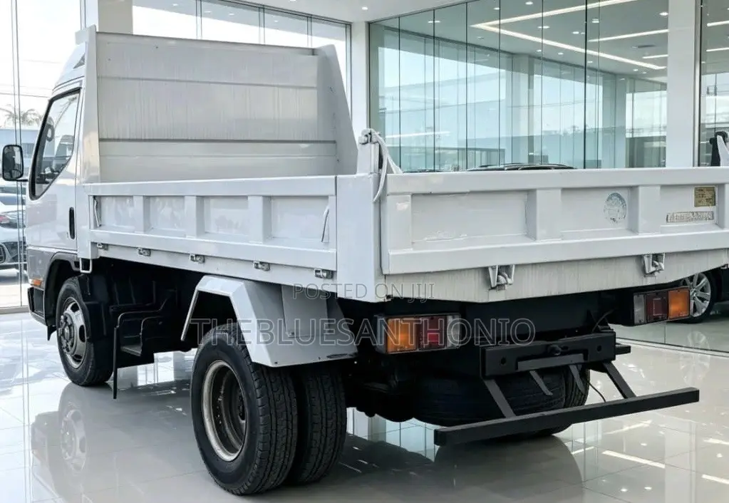 Canter Tipper With Helper on Sale