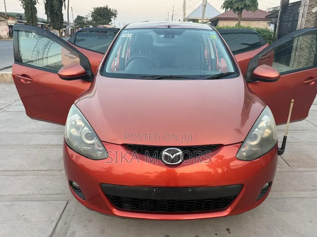 Mazda Demio 2009 Orange