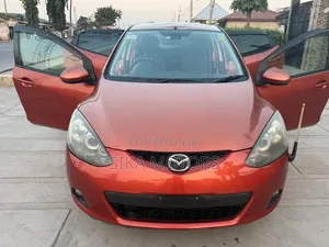 Mazda Demio 2009 Orange