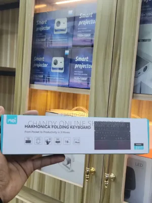 Harmonica Folding Keyboard Bluetooth Connection and Built-in Touchpad.